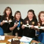 the September birthday celebrants blowing their birthday candles…